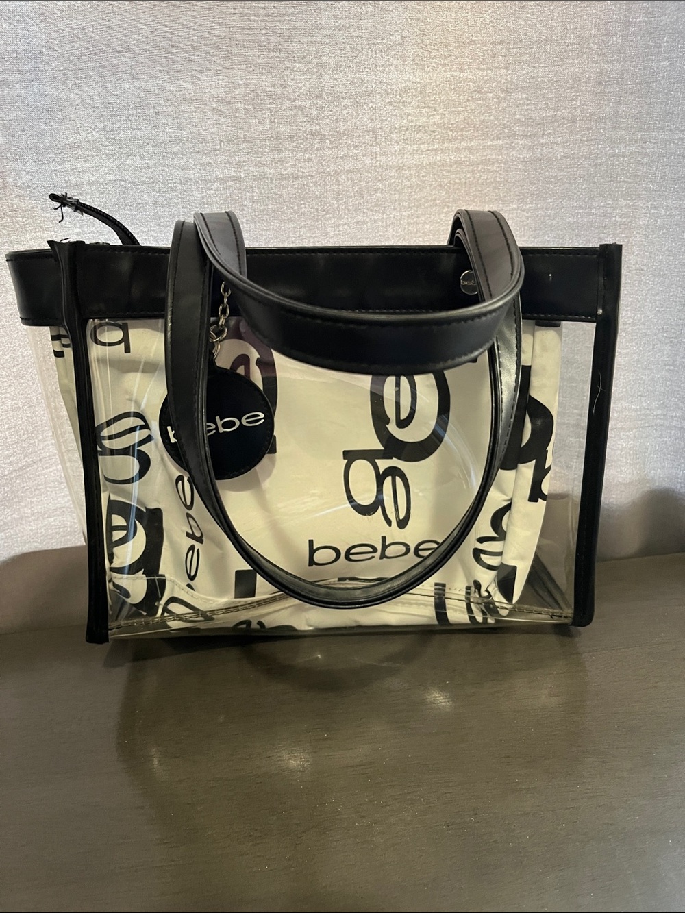 bebe Clear Logo Small Tote Purse in Black and Clear with snap in zipper pouch
